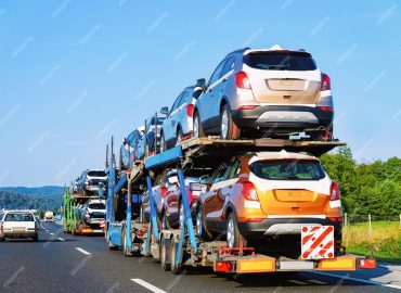 cars-carrier-truck-asphalt-highway-poland-truck-transporter_250132-7763