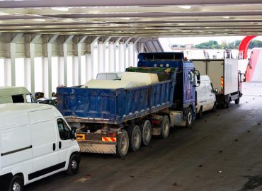trucks-minibuses-located-inside-ferryboat-greece_1268-15825